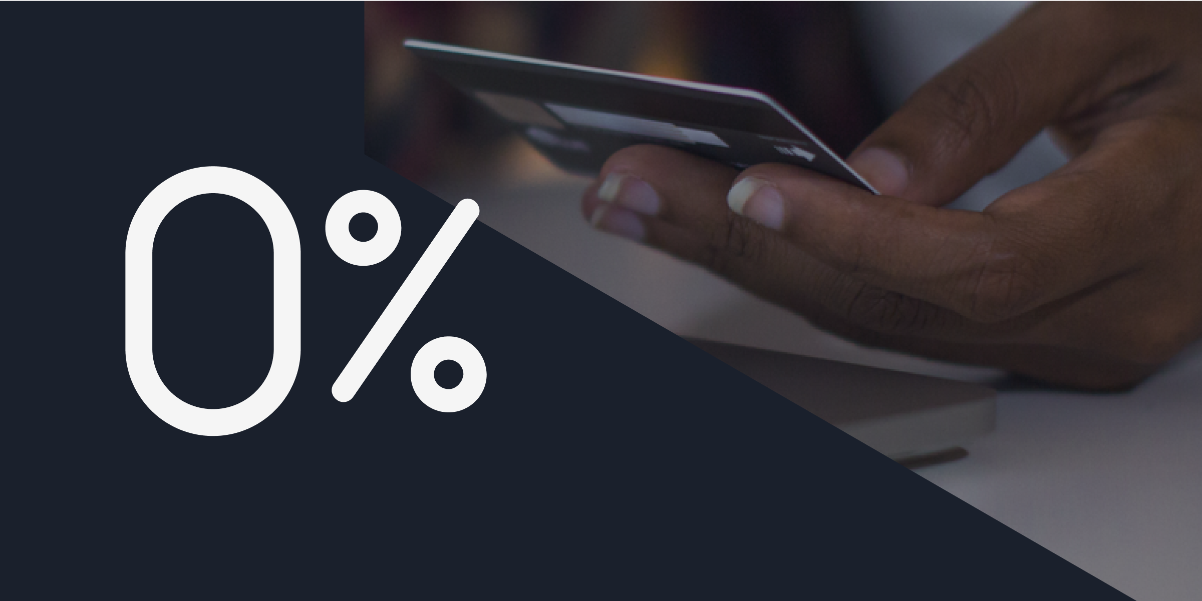 a hand holding a credit card with a navy blue block on top that has a 0% in it